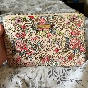 Light pink and floral clutch
